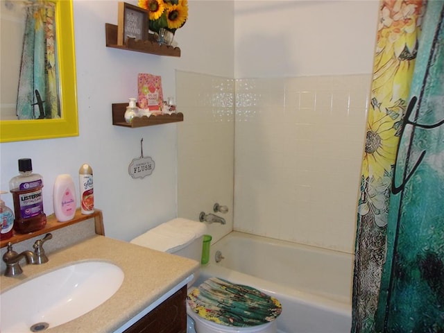 full bathroom with shower / bath combo with shower curtain, vanity, and toilet