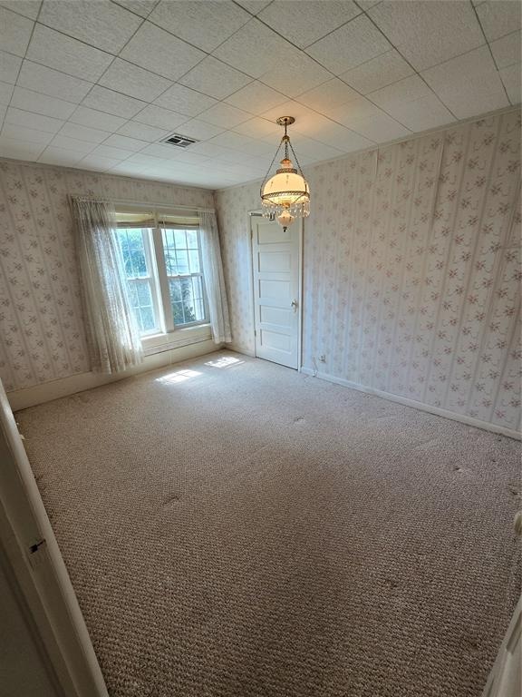 unfurnished room with carpet