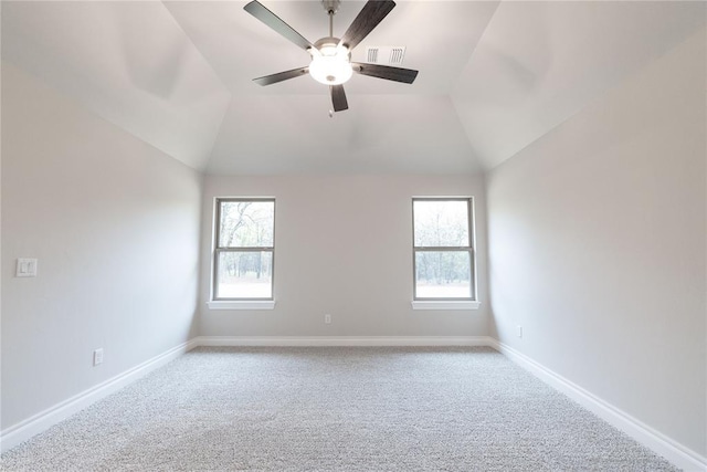 14109 Birch Ln, Edmond, OK 73049 - carpeted empty room featuring visible vents, ceiling fan, baseboards, and lofted ceiling