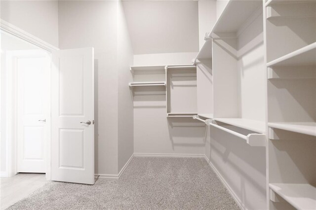 14109 Birch Ln, Edmond, OK 73049 - spacious closet with light carpet