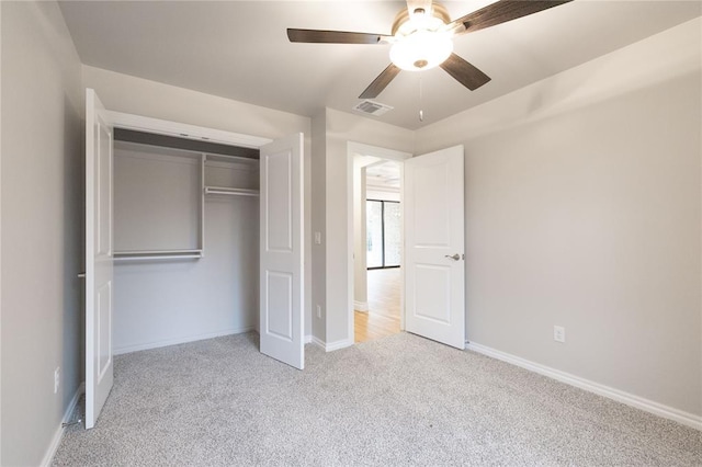 14109 Birch Ln, Edmond, OK 73049 - unfurnished bedroom with a closet, carpet flooring, visible vents, and baseboards