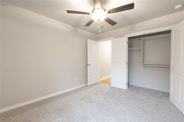 14109 Birch Ln, Edmond, OK 73049 - unfurnished bedroom with visible vents, baseboards, a closet, a ceiling fan, and carpet flooring