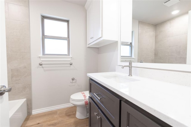 14109 Birch Ln, Edmond, OK 73049 - full bathroom with toilet, baseboards, vanity, and wood finished floors