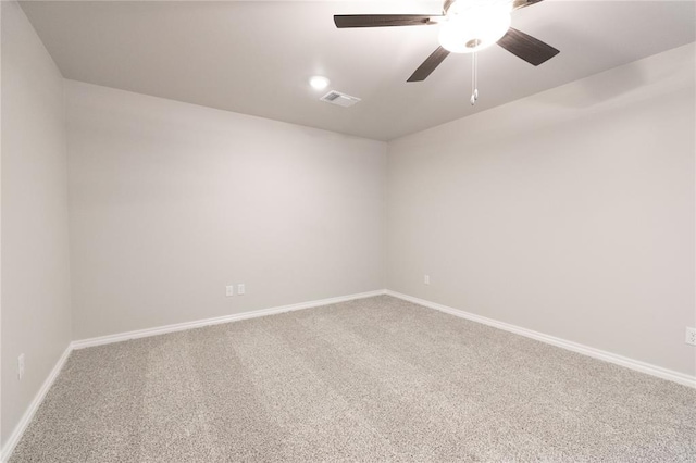 14109 Birch Ln, Edmond, OK 73049 - carpeted spare room with ceiling fan, baseboards, and visible vents