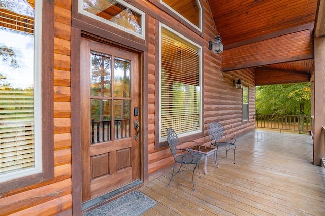 property entrance with covered porch