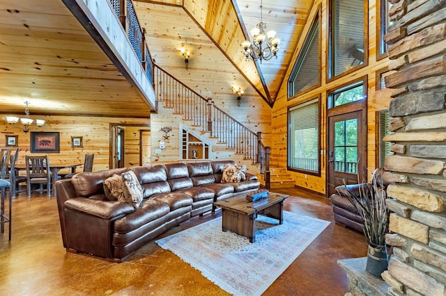 living room with a chandelier, wood walls, high vaulted ceiling, and wooden ceiling