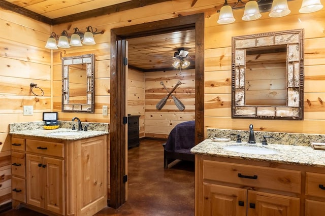 bathroom featuring vanity, wood walls, wooden ceiling, and concrete flooring