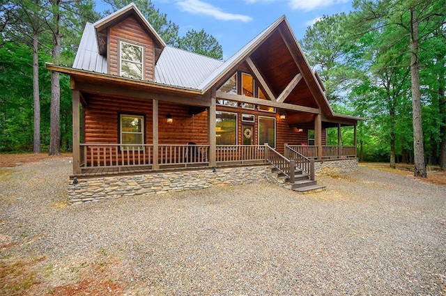 143 Honey Crisp Ln, Broken Bow, OK 74728 - rustic home with a porch, faux log siding, and metal roof