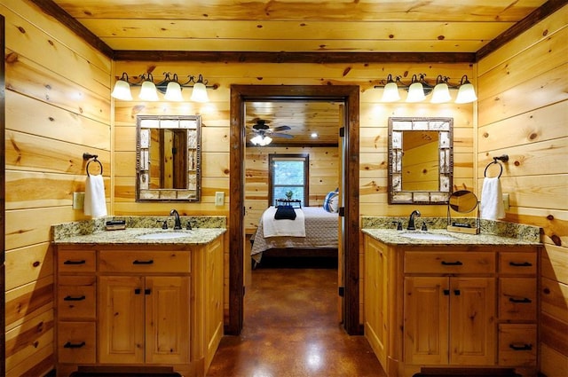 143 Honey Crisp Ln, Broken Bow, OK 74728 - ensuite bathroom featuring wooden walls, two vanities, concrete flooring, wood ceiling, and a ceiling fan