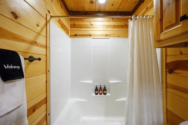 143 Honey Crisp Ln, Broken Bow, OK 74728 - bathroom with wooden ceiling, wooden walls, and shower / tub combo with curtain