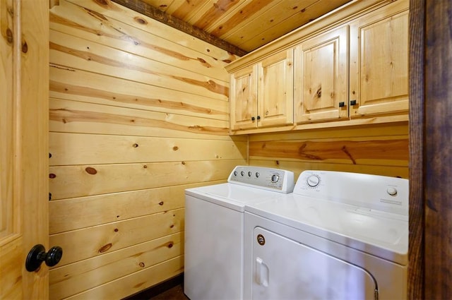 143 Honey Crisp Ln, Broken Bow, OK 74728 - laundry room with separate washer and dryer, cabinet space, wooden ceiling, and wooden walls