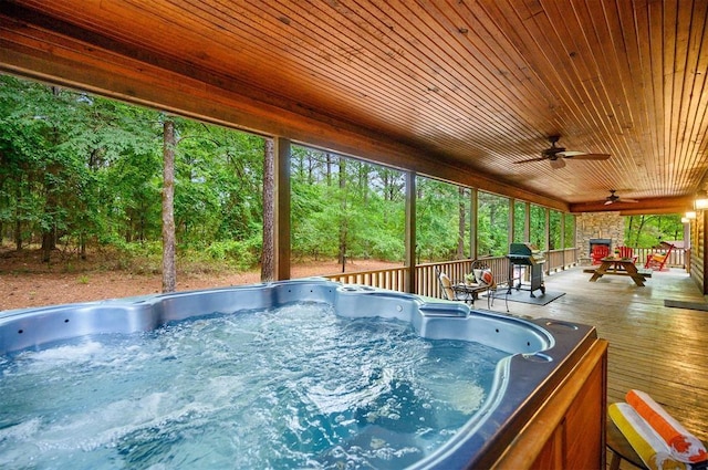 143 Honey Crisp Ln, Broken Bow, OK 74728 - sunroom / solarium featuring a jacuzzi, ceiling fan, and plenty of natural light