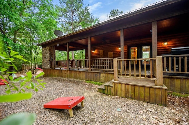143 Honey Crisp Ln, Broken Bow, OK 74728 - back of property featuring a porch