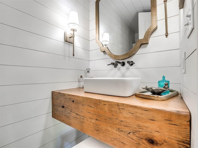 bathroom with tile patterned flooring and vanity