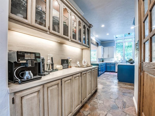 kitchen featuring ornamental molding