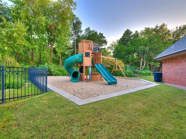 view of jungle gym with a lawn