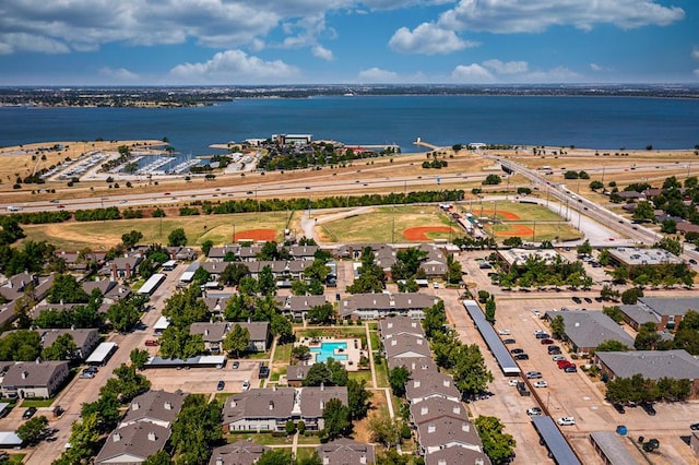 birds eye view of property featuring a water view