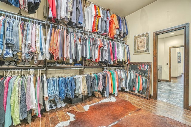 spacious closet featuring hardwood / wood-style flooring