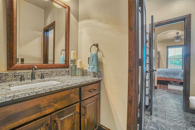 bathroom with vanity and ceiling fan