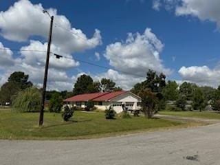 1305 SE 15th St, Wagoner, OK 74467 - view of asphalt road with street lights