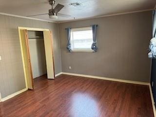 1305 SE 15th St, Wagoner, OK 74467 - unfurnished bedroom featuring dark wood-style flooring, baseboards, crown molding, and ceiling fan
