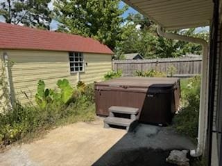 1305 SE 15th St, Wagoner, OK 74467 - view of patio with a hot tub