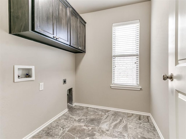 washroom with electric dryer hookup, cabinets, hookup for a washing machine, and a healthy amount of sunlight