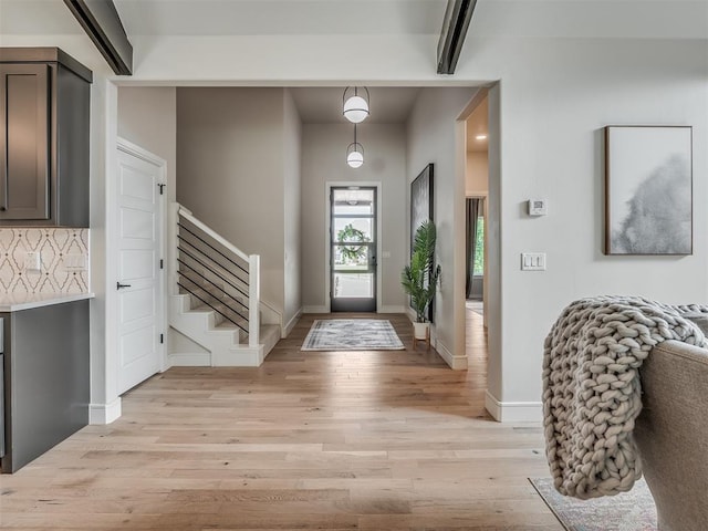 entrance foyer featuring light hardwood / wood-style floors