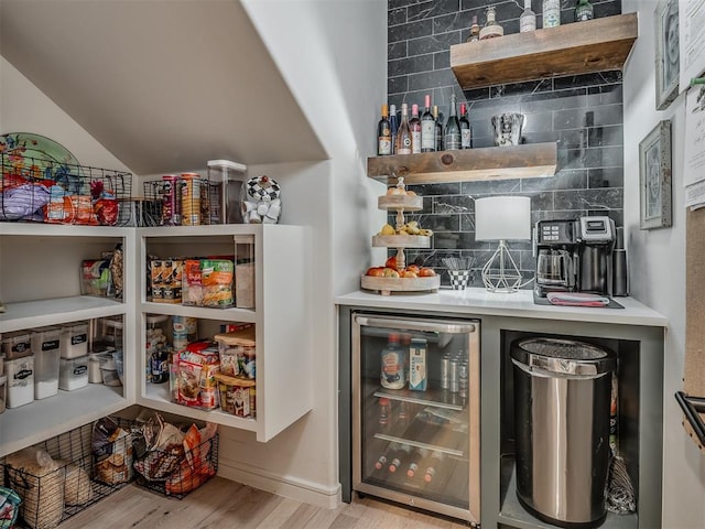 pantry featuring wine cooler