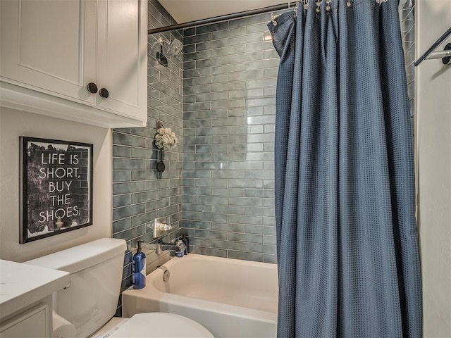 full bathroom featuring vanity, toilet, and shower / bathtub combination with curtain