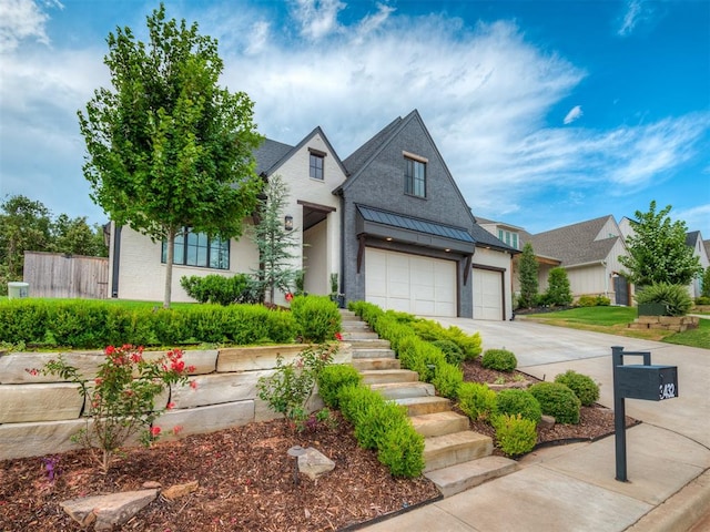 view of front of property with a garage