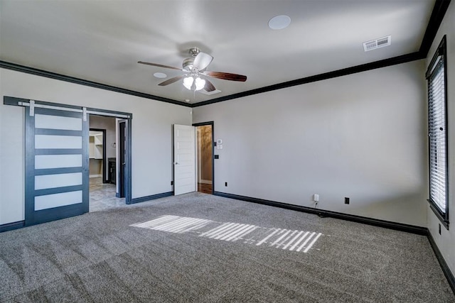 unfurnished bedroom with light colored carpet, ceiling fan, and ornamental molding