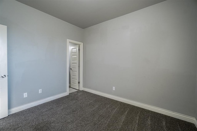 empty room with carpet flooring