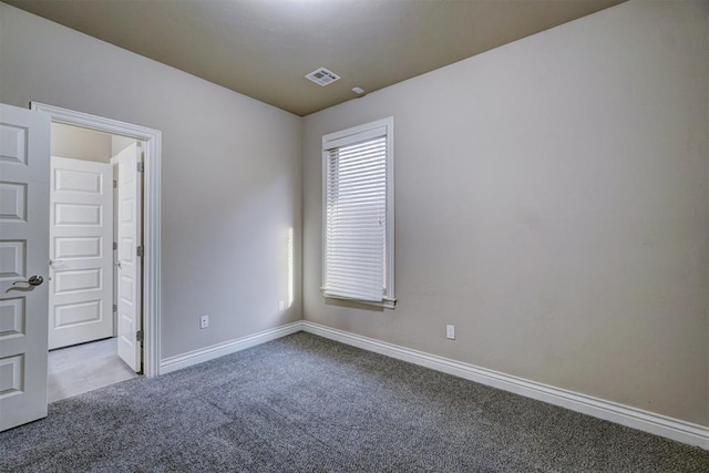 view of carpeted spare room