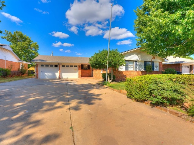 single story home with a garage