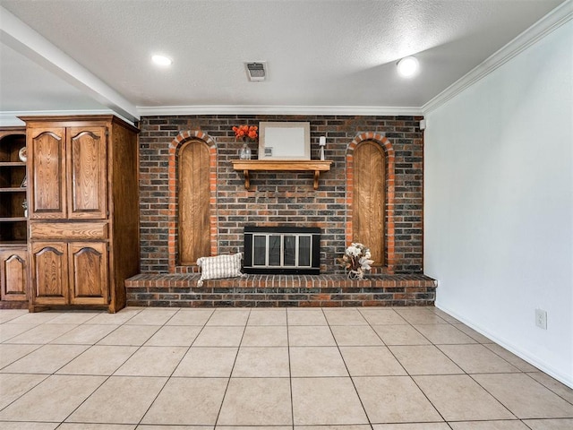 unfurnished living room featuring crown molding, light tile patterned floors, a textured ceiling, and a brick fireplace