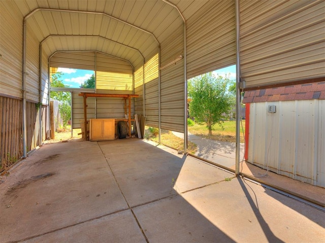 view of parking with a carport