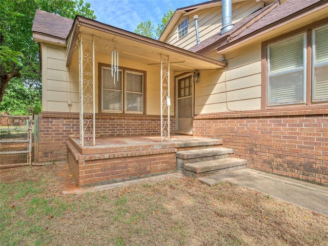 doorway to property with a porch