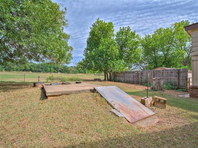 entry to storm shelter with a lawn