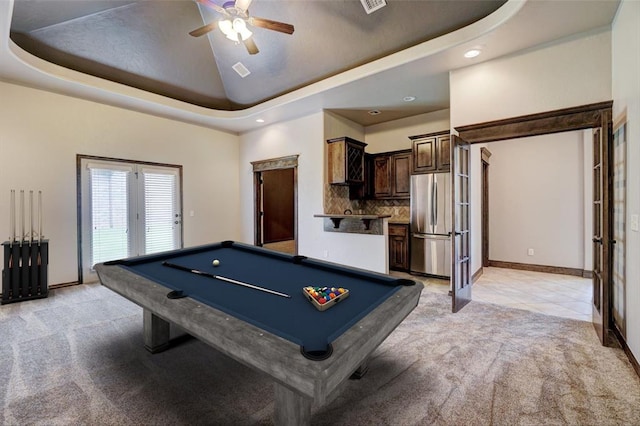 recreation room featuring french doors, light carpet, billiards, and a tray ceiling