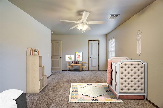 bedroom with light colored carpet and ceiling fan