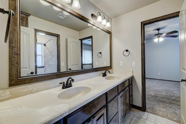 bathroom featuring vanity, tile patterned floors, and ceiling fan