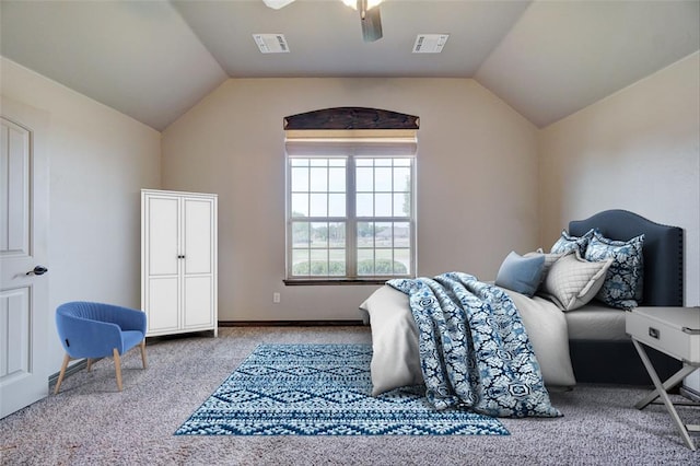 bedroom with ceiling fan, light colored carpet, and lofted ceiling