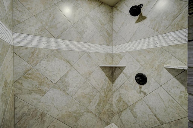 details with a tile shower