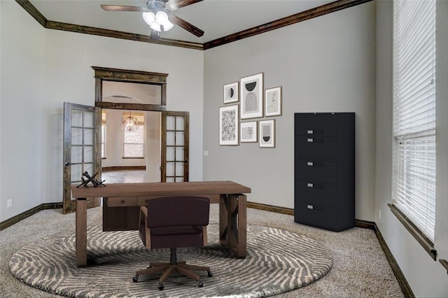 office space featuring ornamental molding, carpet flooring, and baseboards