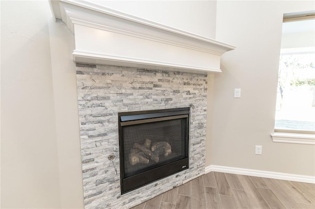 room details with a stone fireplace