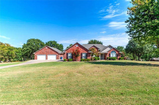 ranch-style house featuring a front yard and a garage