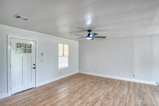 foyer featuring ceiling fan and light hardwood / wood-style floors