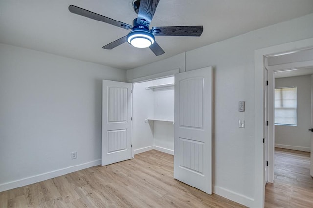 unfurnished bedroom featuring ceiling fan and light hardwood / wood-style floors