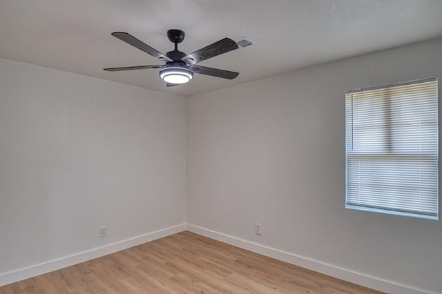 unfurnished room with ceiling fan and light hardwood / wood-style floors